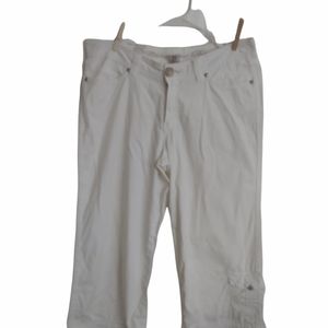 Christopher Blue cropped white pants. 8